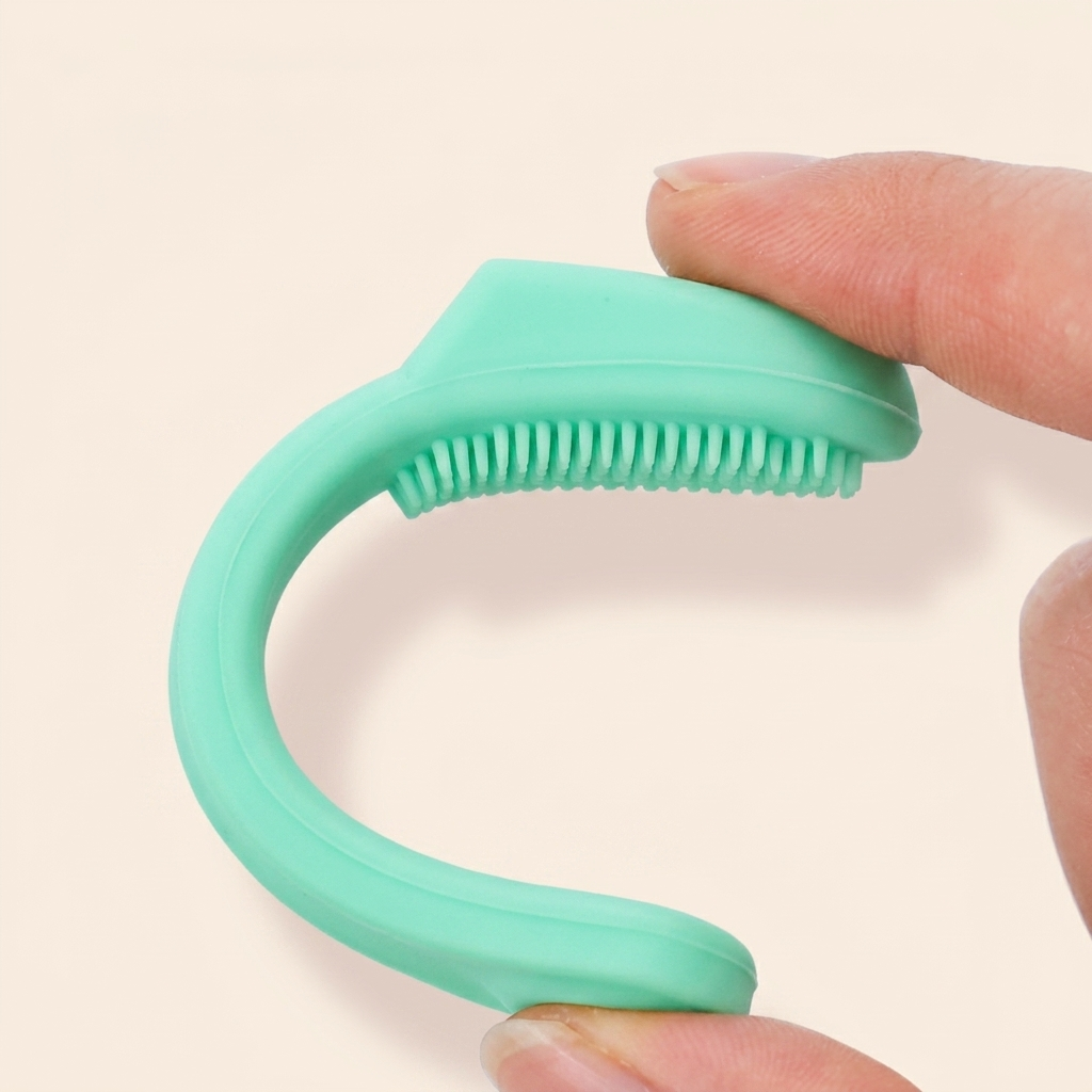 PetRoost cat chin brush — flexible silicone bent to show durability